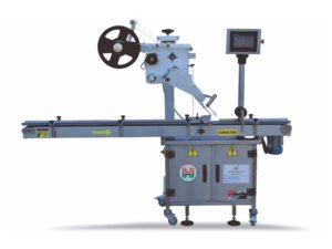 Top side labeling machine